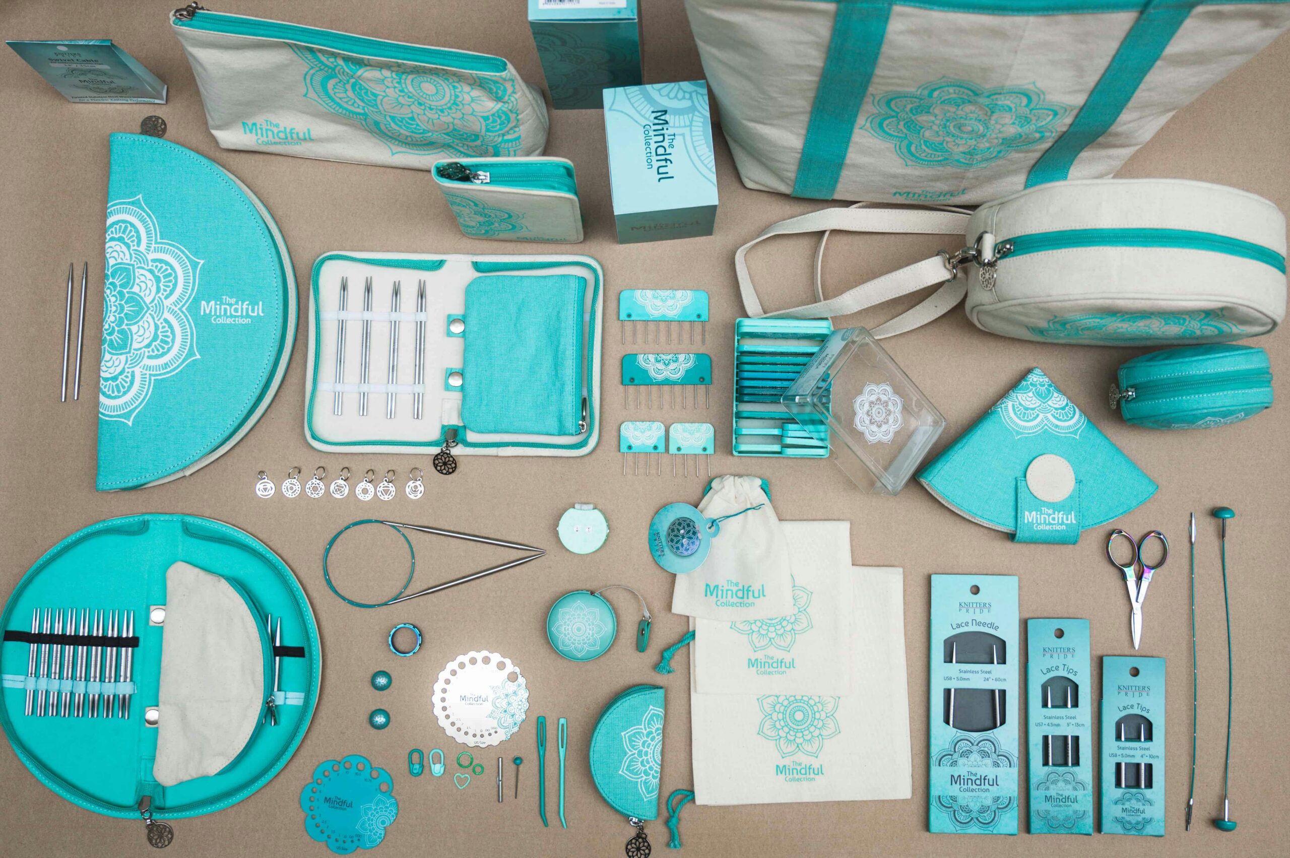 Detailed flat lay of a complete mindful sewing kit featuring turquoise accessories and tools.